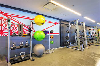 a gym with weights and other exercise equipment